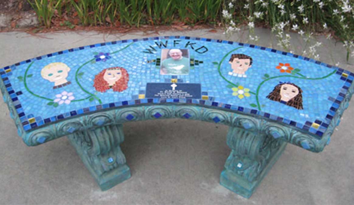 Mosaic Memorial Garden Bench with Portrait Tiles of Father Kevin Curved Bench with Children by Water's End Studio Artist Linda Solby